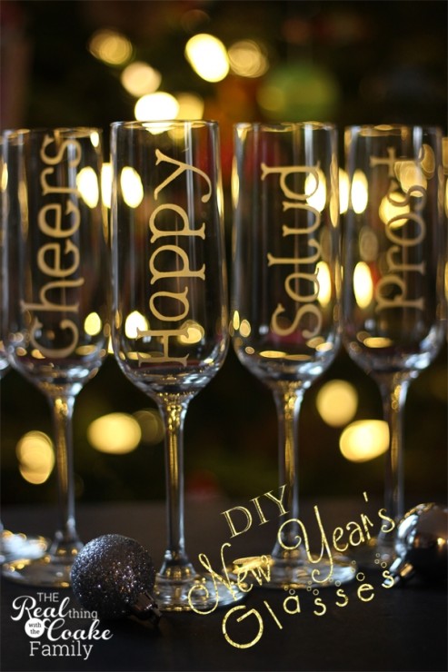 New Year's champagne glasses personalized with glass etching to toast in 6 different languages. Easy DIY for New Year's celebrating. #ChampagneGlasses #NewYears #DIY