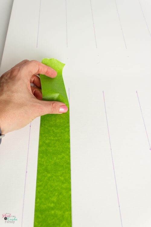 taping off lines for paint Step by step tutorial on how to paint gingham and make the cutest wall art out of a craft store canvas. Perfect craft project to make DIY wall art.