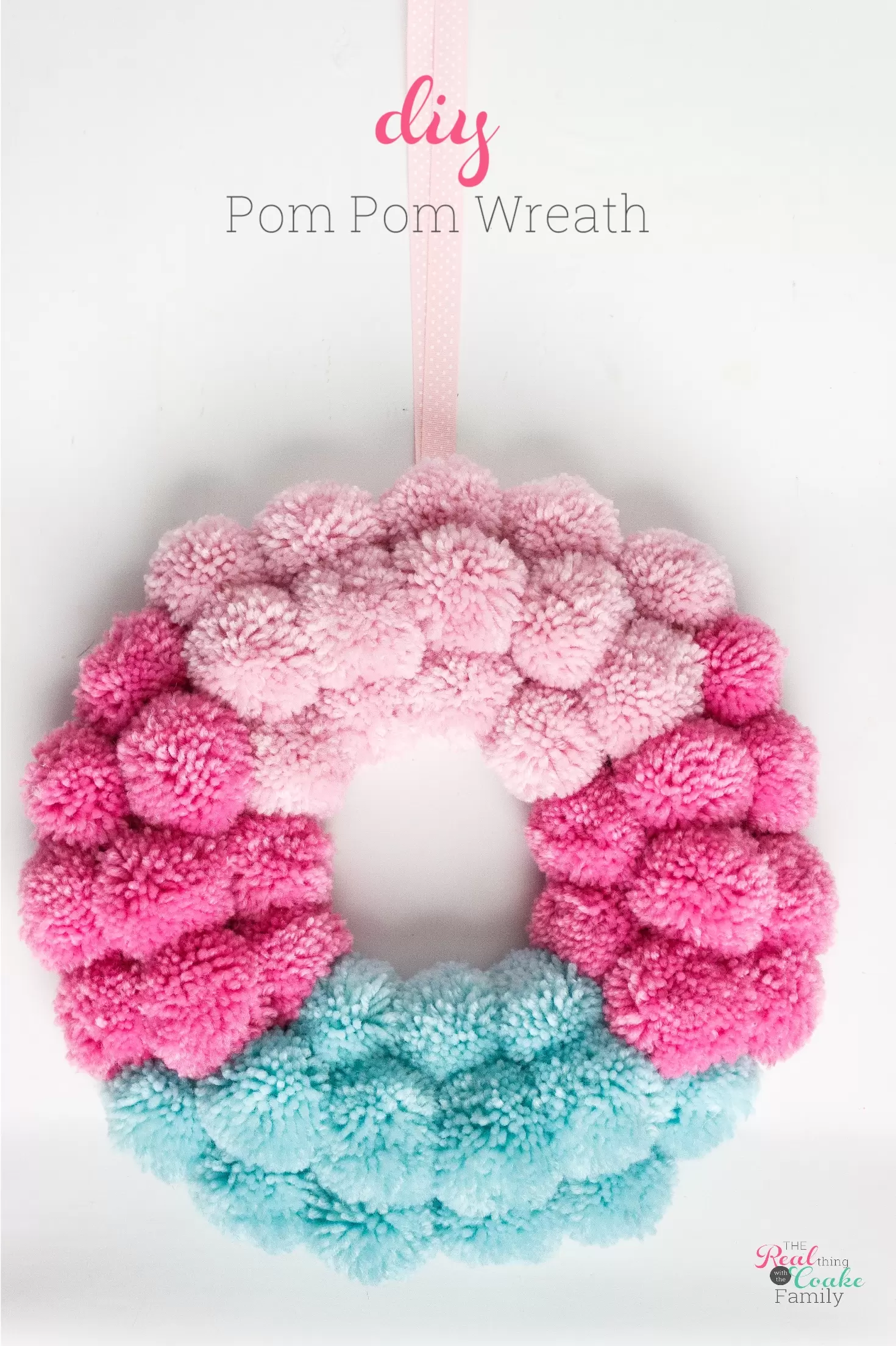 Cute DIY pom pom wreath tutorial showing step by step how to make this easy wreath using a pom pom maker. Perfect pom pom crafts for your home decor.